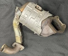 Genuine Mopar Catalytic Converter 68508659AA New. Price: $2400.00.