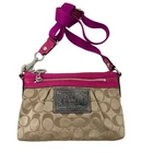Coach Mini Purse Poppy Tan Pink Signature Crossbody Bag Pre-owned. Price: $50.00.